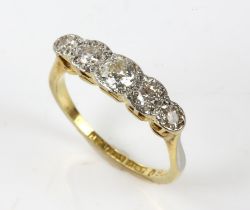 Diamond five stone ring, five graduated round brilliant cut diamonds, estimated total diamond