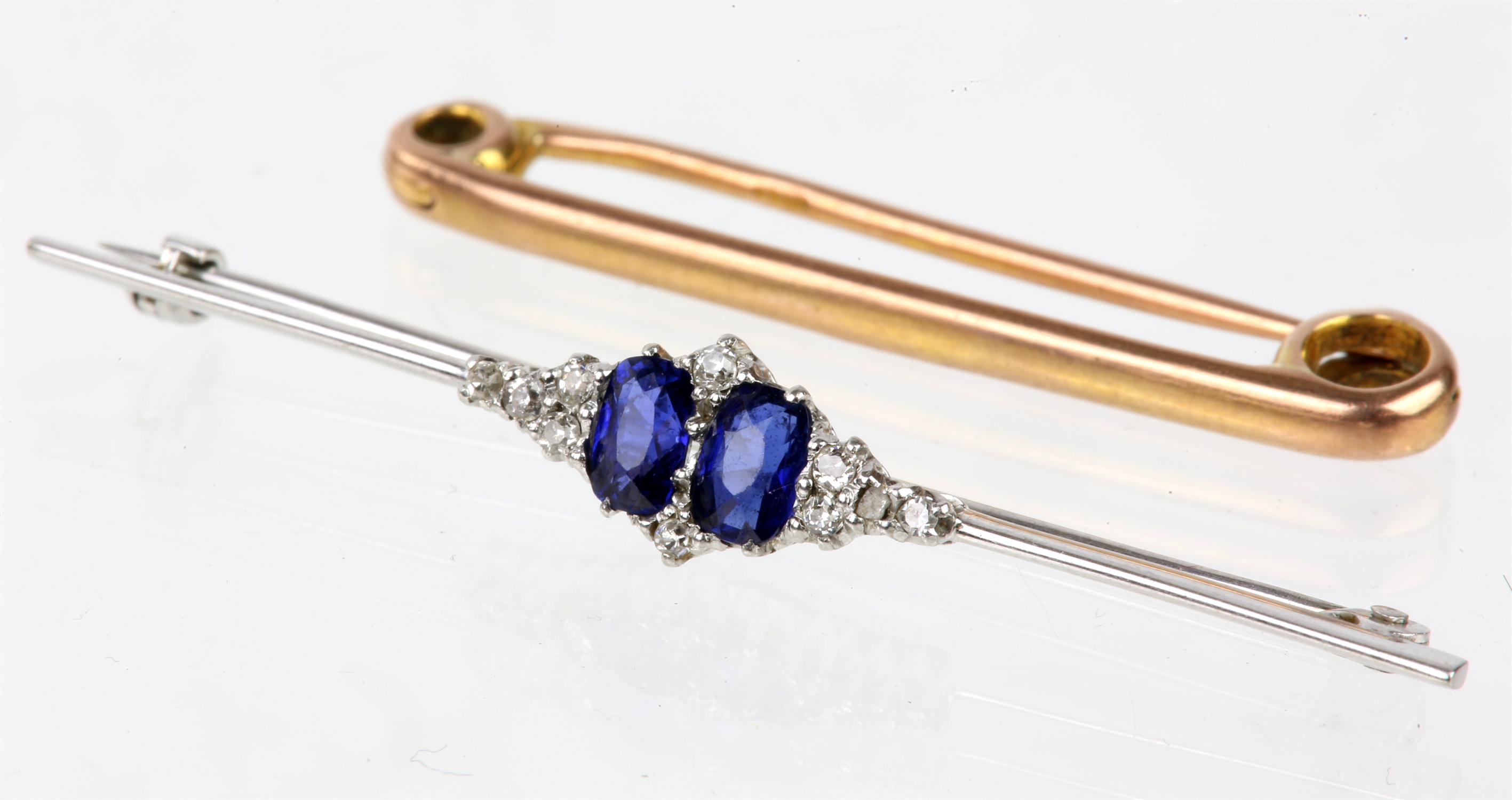 Two bar brooches, a stamped 18ct and platinum brooch set with sapphire and diamonds,