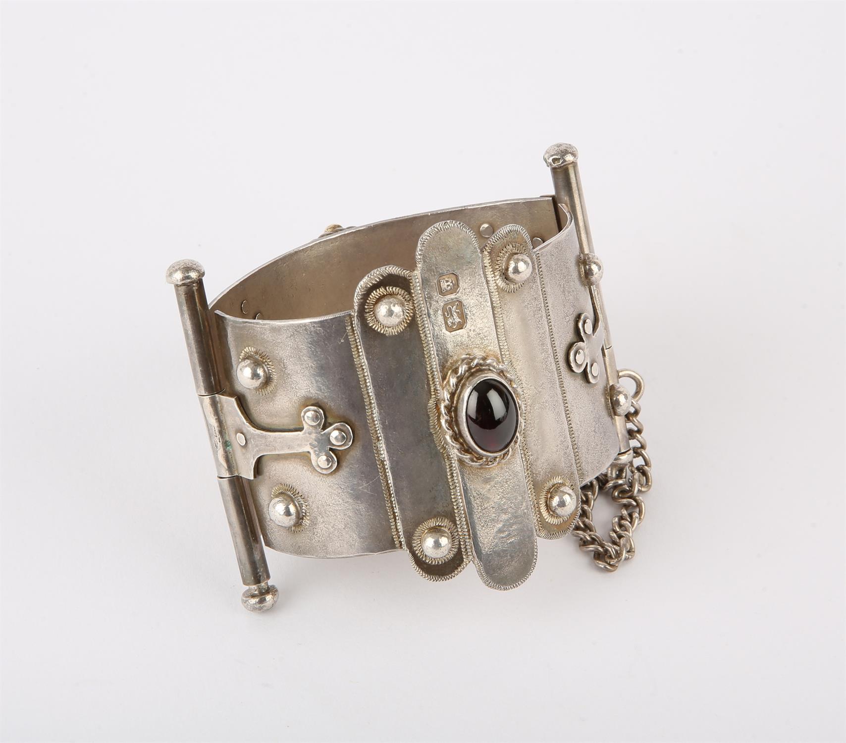 Large silver bangle by Michael A Bolton, set with a rock crystal and a garnet - Image 2 of 3