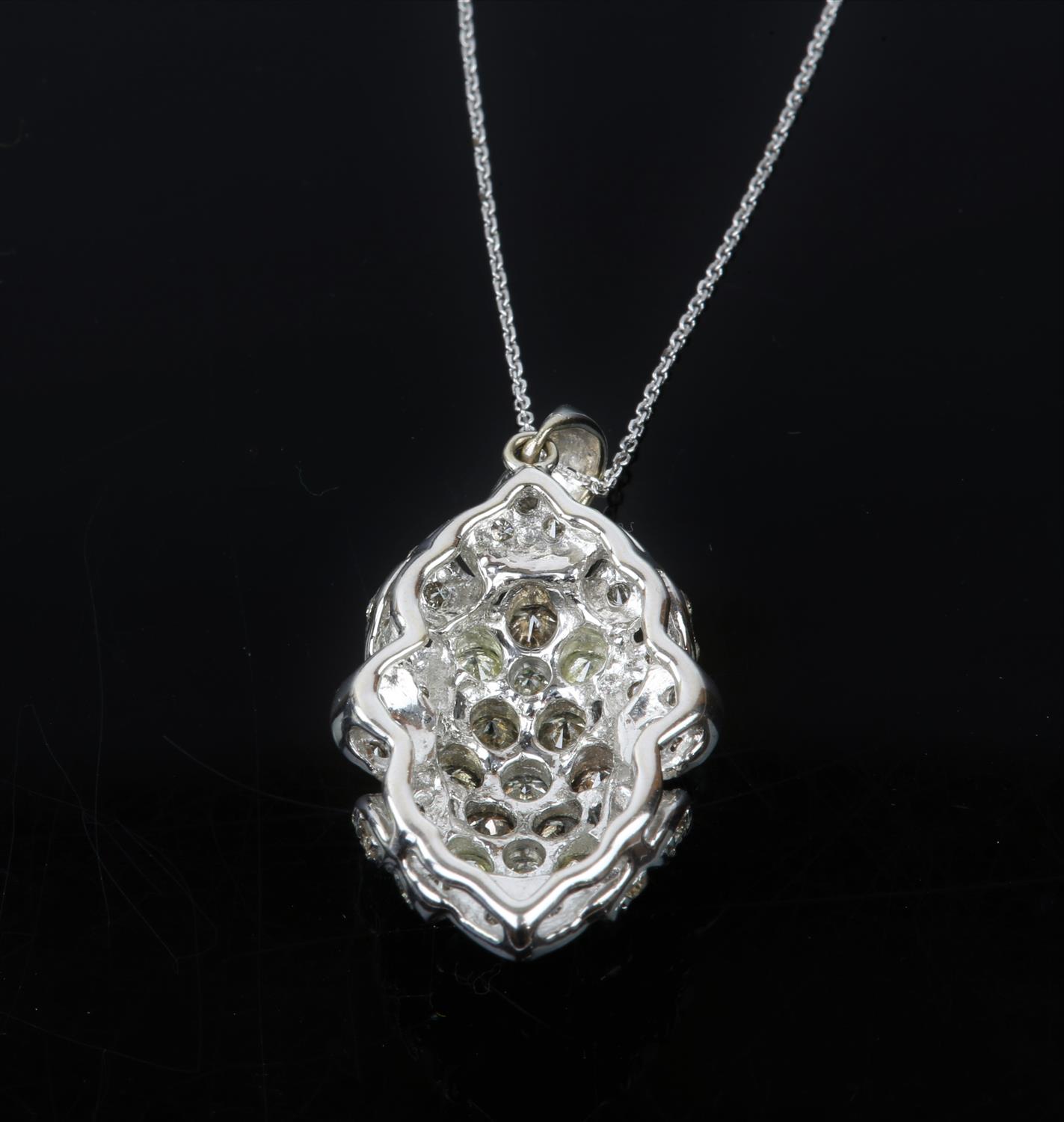 Diamond set pendant, round brilliant diamonds set in a floral cluster design, in stamped 18ct white - Image 4 of 7