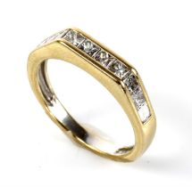 Diamond half eternity ring, ten princess cut diamonds channel set in tested 18ct yellow gold,