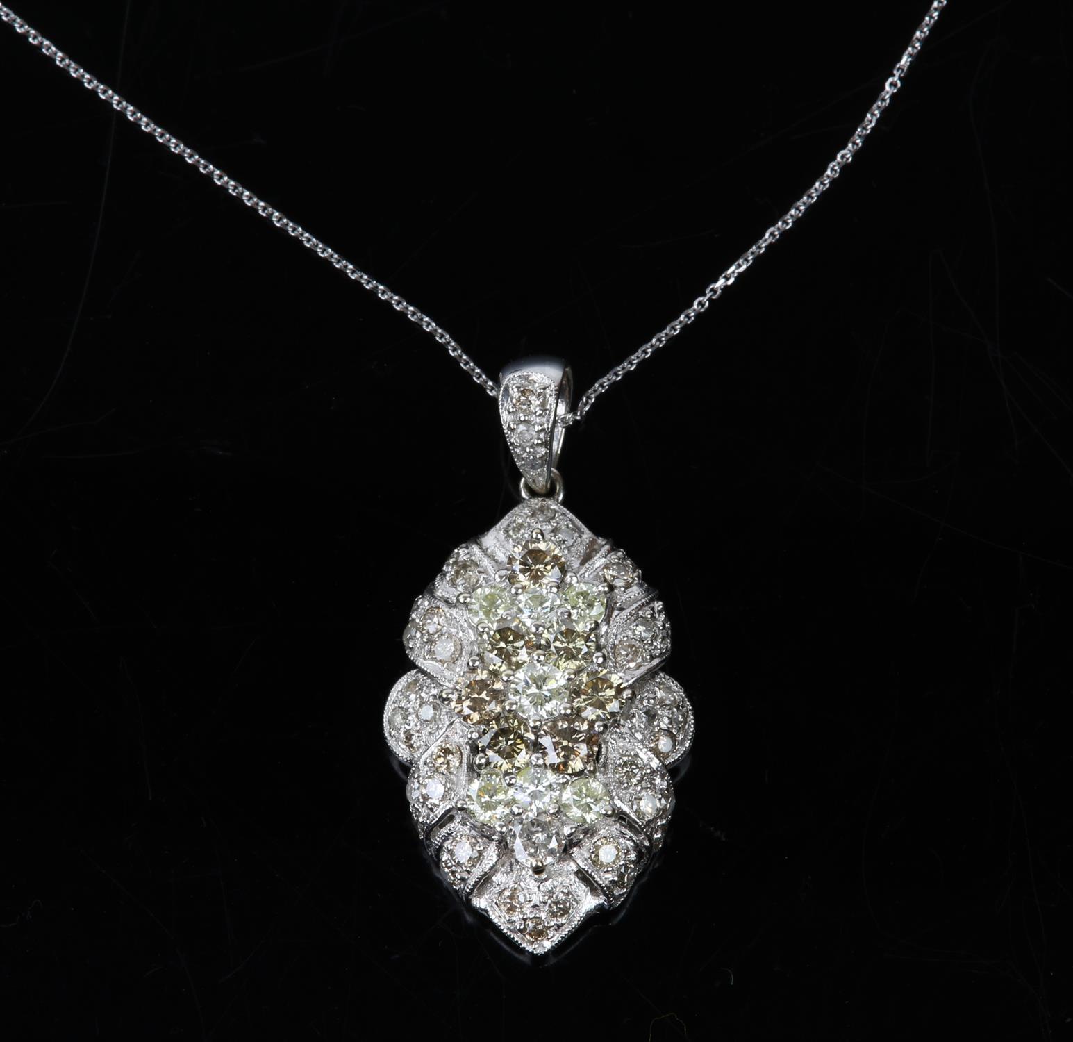 Diamond set pendant, round brilliant diamonds set in a floral cluster design, in stamped 18ct white