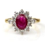 Ruby and diamond cluster ring, oval cut ruby, estimated weight 1.16 carats, with a surround or