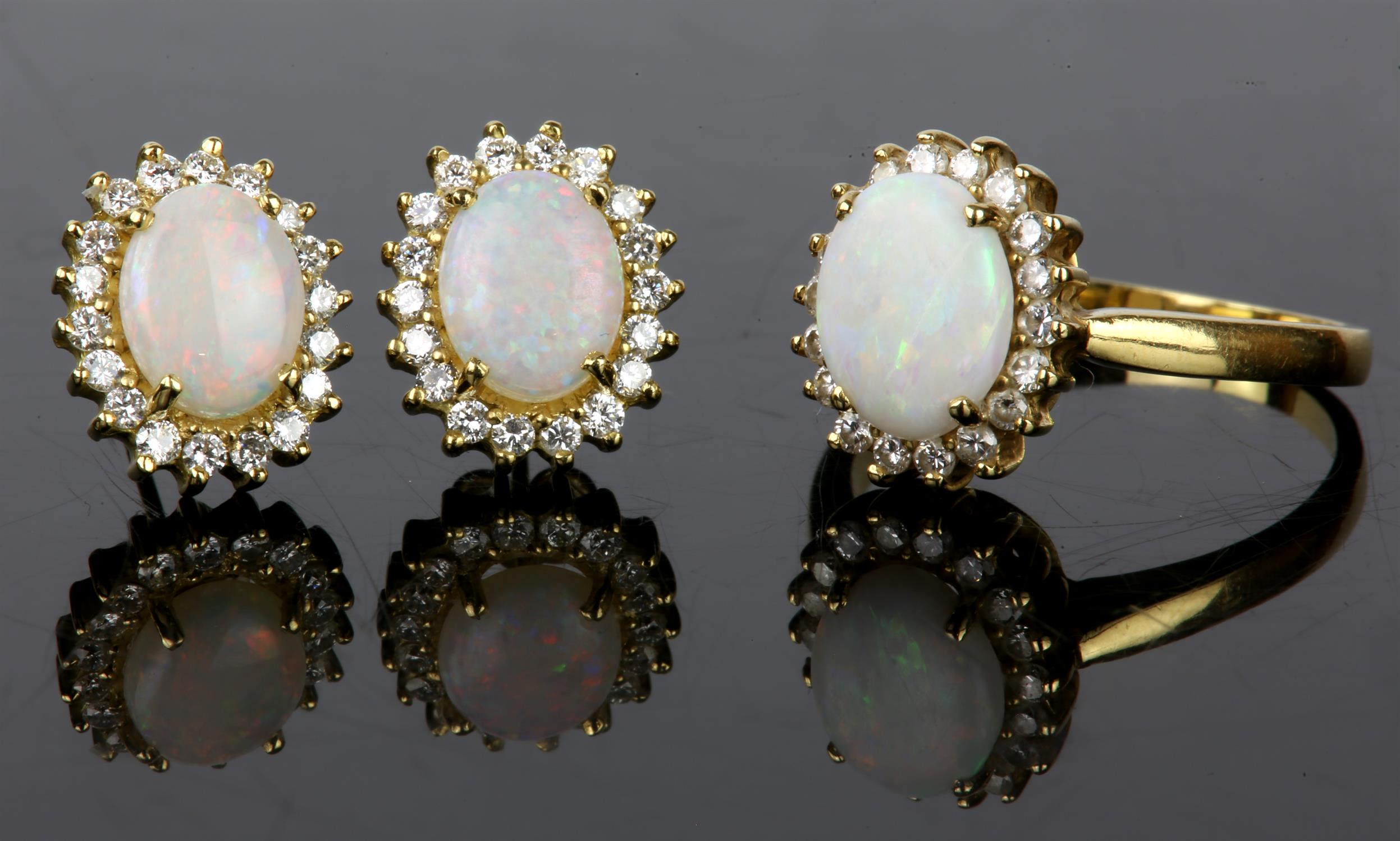 An opal and diamond ring, set with an oval cabochon cut opal weighing an estimated 1. - Image 2 of 4