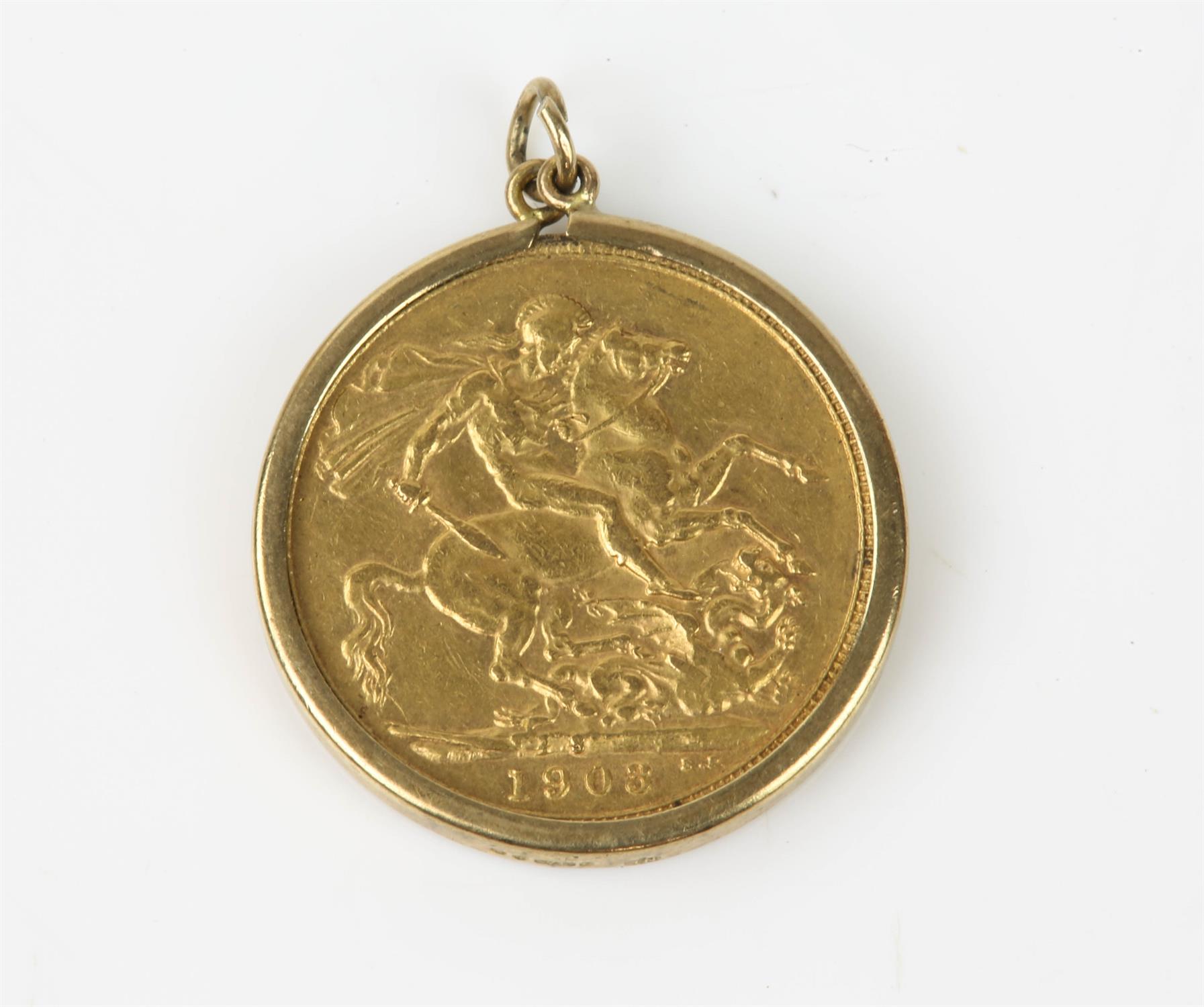 A sovereign pendant, set with an Edward VII full sovereign, dated 1903 in a 9ct yellow gold pendant