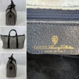 GUCCI large vintage 1980s GG monogrammed SPEEDY zipped holdall bag in coated canvas.