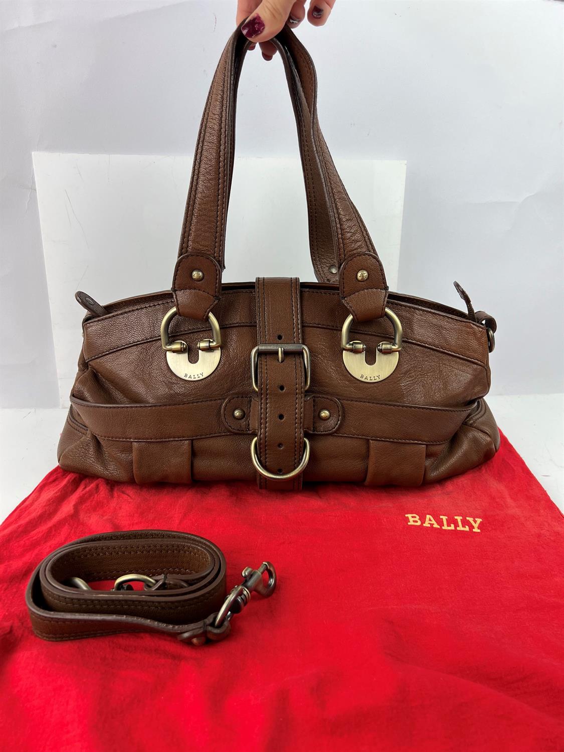 One large brown leather BALLY zip top, double top-handle handbag with brass hardware and long strap.