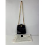 A quality DUNHILL vintage navy/blue leather handbag with heavy gold coloured long chain handle and