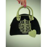 JUICY COUTURE black wool zipped top-handle bowling bag with green leather detail and J green