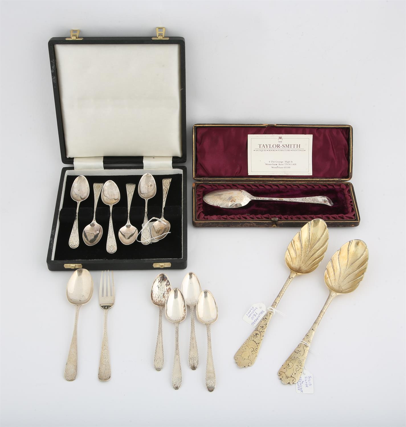 18th and 19th century silver, comprising two matching silver gilt table spoons, decorated with