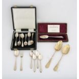18th and 19th century silver, comprising two matching silver gilt table spoons, decorated with