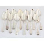 Twelve various 18th Century Old English Pattern silver table spoons, 24 ozs 752 grms SILVER