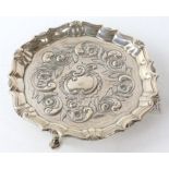 George II silver waiter with embossed flower and foliage decoration, London, 6.5 ozs 204 grams