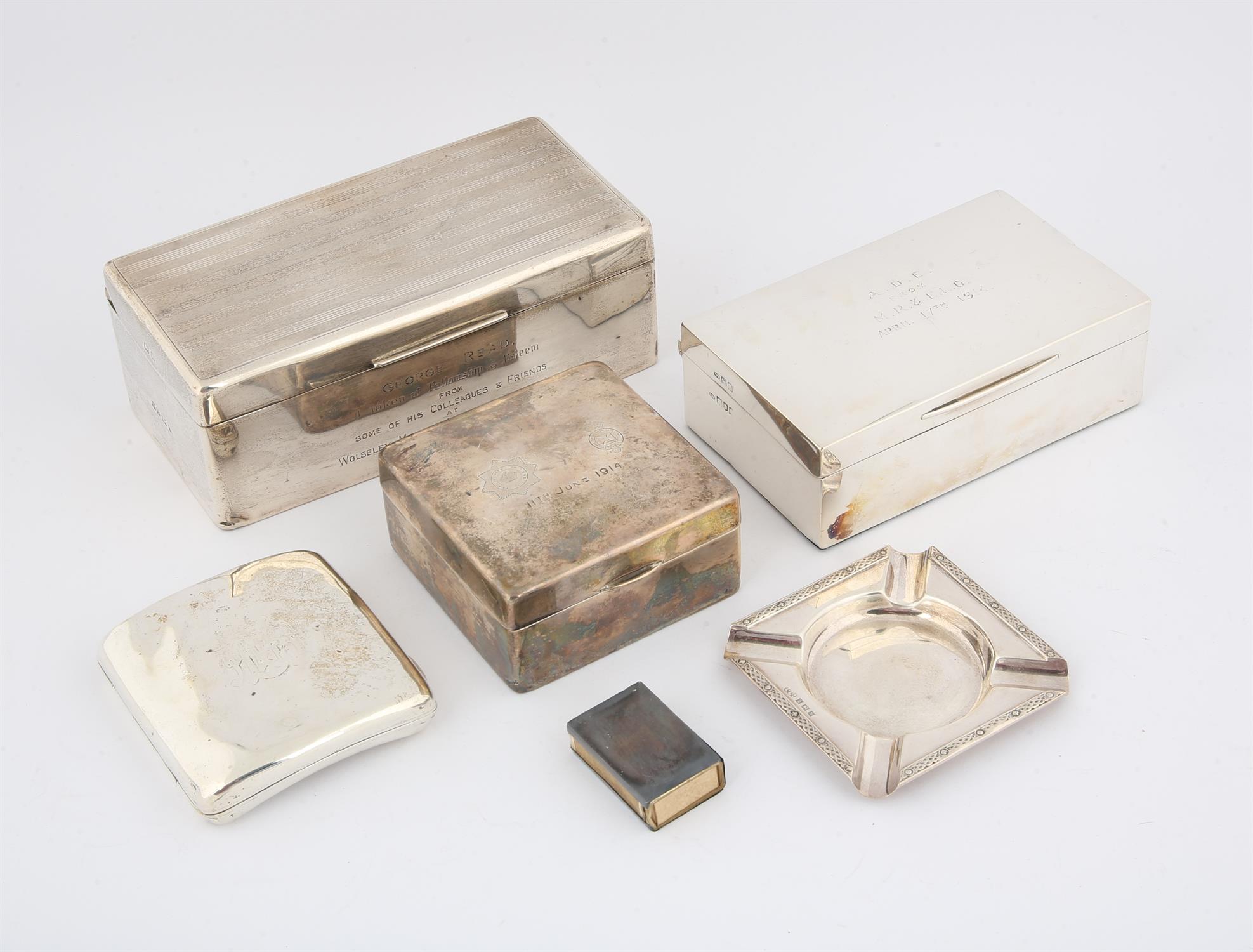 Three presentation cigarette boxes, cigarette case, ash tray, silver match box cover and a cigar