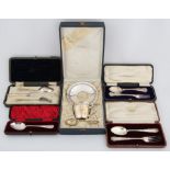 Five various cased silver christening sets comprising, knife fork and spoon,two x spoon and fork,