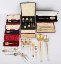 A collection of twenty seven replica anointing spoons. mostly silver. SILVER COLLECTION OF SIR