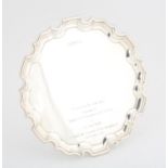 Elizabeth II silver round waiter with shaped border, Presentation inscription, "presented by Mr