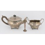 George V. oval silver teapot and sugar bowl on splay feet, by C S Harris & Sons Ltd London 1913,