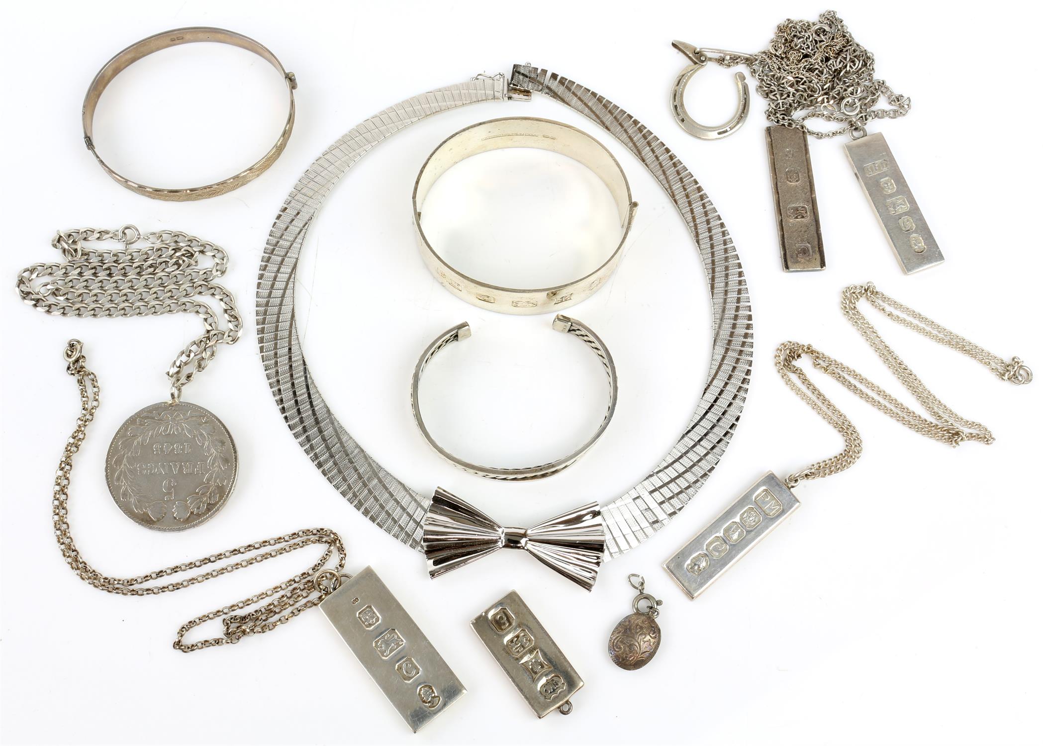 Collection of silver jewellery, including a choker necklace, articulated design with a bow to the