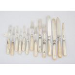 Fourteen various George III and later mother of pearl handled knives and forks SILVER COLLECTION
