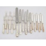 Various silver handled knives (twelve various) and six forks SILVER COLLECTION OF SIR RAY