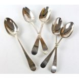 Pair of George III silver engraved table spoons, another pair, and another single George III table