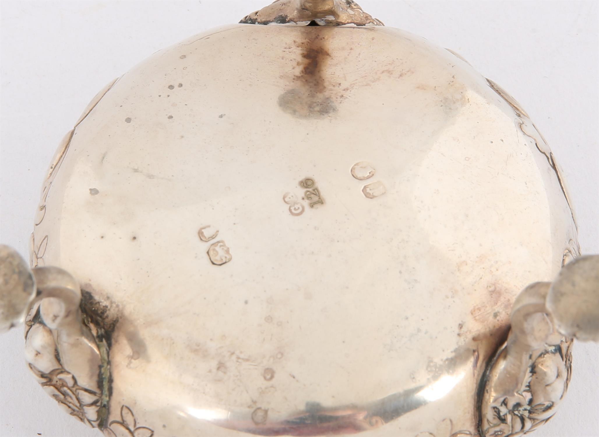 Victorian silver, round salt with floral embossed border on three feet, by GA, London 1858, - Image 2 of 2