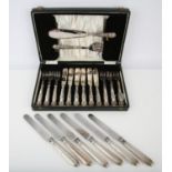 George V cased set of six fish knives and forks with servers, and a set of six silver handled large