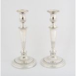 Pair of George III silver gadrooned candlesticks on tapering stems, Sheffield 1805,