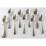 Ten various George III and later silver table spoons with bright cut engraving, 17.