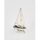 Model of a silver two masted sailing boat with import marks, 8 cms high SILVER COLLECTION OF SIR