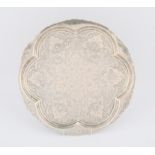Middle Eastern six lobed salver withall over engraved decoration, 28 cms SILVER COLLECTION OF
