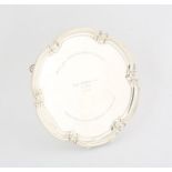Elizabeth II, silver round salver with shaped border on four feet, inscribed "Ray Tindle CBE