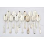 Thirteen various 18th century silver Old English Pattern table spoons, 23.6 ozs 734 grams