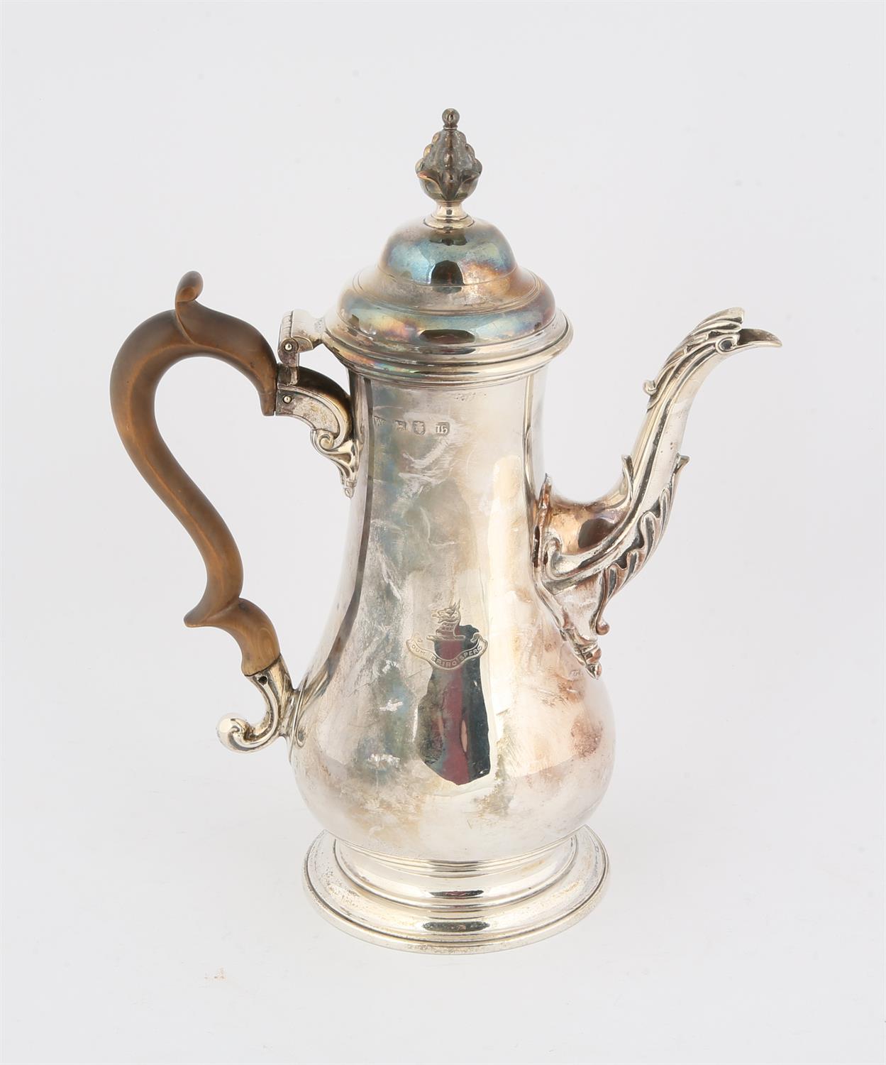 George III coffee pot of baluster form and scrolling fruitwood handle, engraved with an armorial