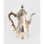 George III coffee pot of baluster form and scrolling fruitwood handle, engraved with an armorial