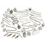 A Collection of 15 silver Albert chains of various lengths, together with 10 silver medals,