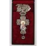 White metal crucifix, marked 925, the central enamel plaque surrounded by semi-precious stones 15 x