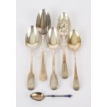 Five various 18th and 19th century silver spoons including a berry spoon and an Art Nouveau