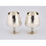 Pair of silver Queen Elizabeth II Jubilee goblets with bark effect maker mark SC, Sheffield 1977,