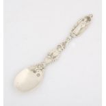 Dutch silver caddy spoon the top with a saint and also a lady, English import marks SILVER