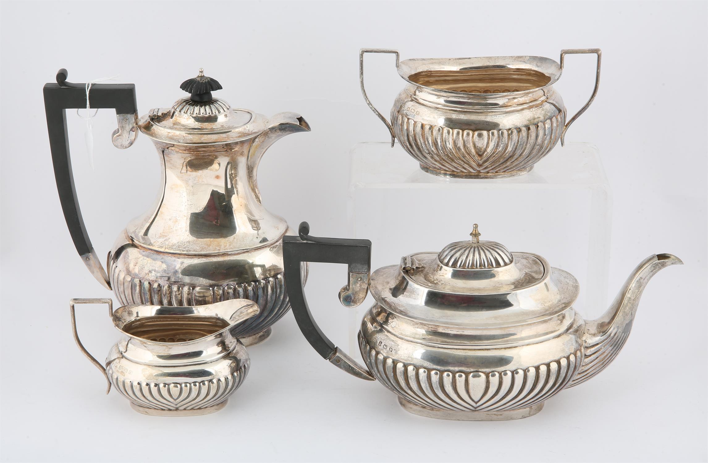 George VI, oval fluted silver four piece tea and coffee service, makers S&W, Birmingham 1937,