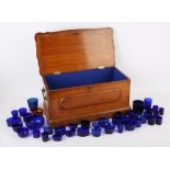 A box with contents, blue glass liners SILVER COLLECTION OF SIR RAY TINDLE CBE DL 1926-2022 The