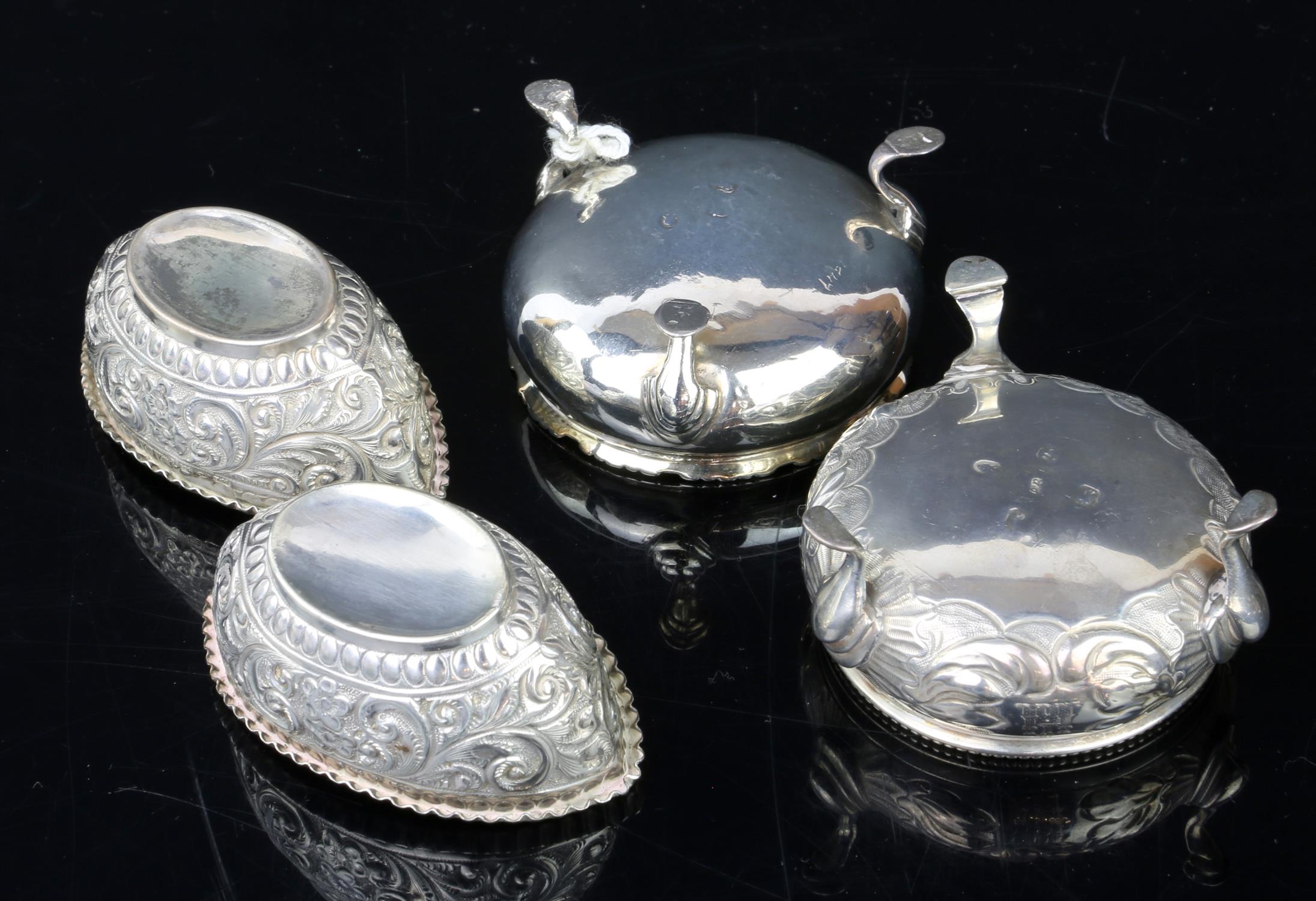 Pair of Edward VII boat shaped silvre salts with embossed decoration, by Mitchell Bosley & Co - Image 2 of 3