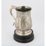 George III silver mug by Samuel Whitford I, London 1763, later embossed with a tavern scene,