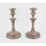 A pair of George V silver candlesticks, Sheffield, 1920, loaded, 22cm high (2)