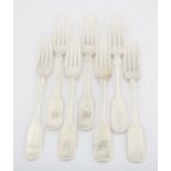 Seven Victorian English provincial silver fiddle pattern dessert forks, all with Exeter hallmarks,