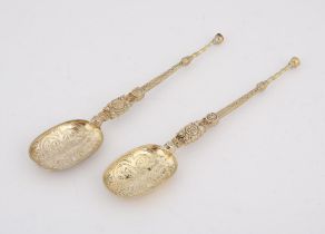 Pair of cast and engraved silver copies of The Royal Annointing or Coronation spoon (London, 1910,