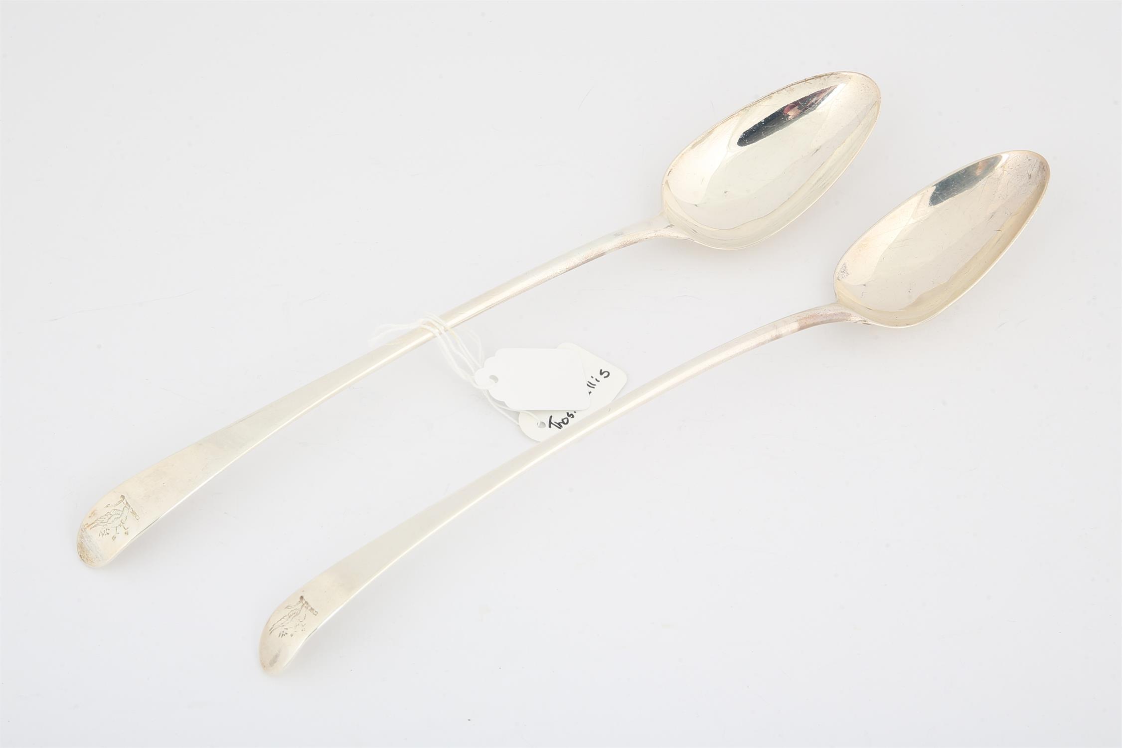 Pair of George III Old English Pattern silver gravy spoons. by Thomas Wallis, London 1780,