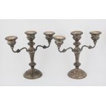 Pair of modern silver three light candelabra, with scroll arms on round bases, Birmingham 1979, H22.